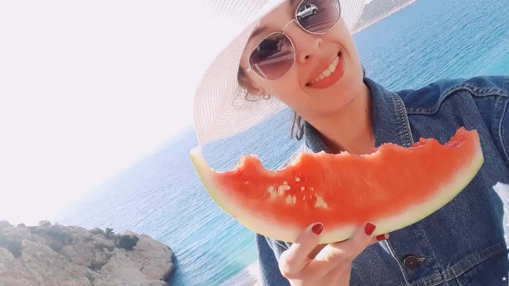 fay eating watermelon at kaputas beach kas in turkey capetocasa